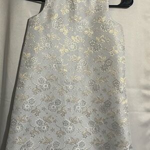 Rachel ZoeBaby Blue with a floral pattern, gold accents and pearls